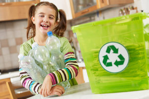 little-girl-recycling-in-kitchen