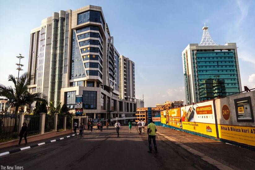 1464128337Pedestrans-walk-through-the-Car-Free-zone-in-Kigali