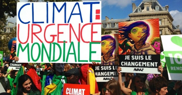 Climate-change-activists-in-Paris-2014-e1448743202438