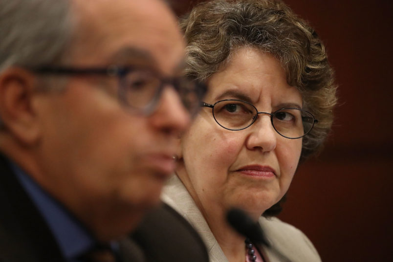 WASHINGTON, DC - JULY 19: Ellen Weintraub, commissioner of the Federal Election Commission listens as Norm Ornstein, resident scholar at the American Enterprise Institute speaks during the Democratic Policy and Communications Committee hearing in the Capitol building on July 19, 2017 in Washington, DC. The hearing dealt with the subject of "Democracy for Sale" and how they feel that the campaign finance system allows foreign governments to buy Influence in the U.S. Elections and what can be done about it. (Photo by Joe Raedle/Getty Images)